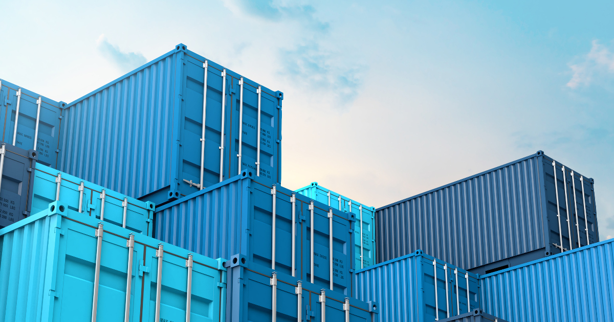 Blue Cargo Freight Boxes Stacked to Skyline